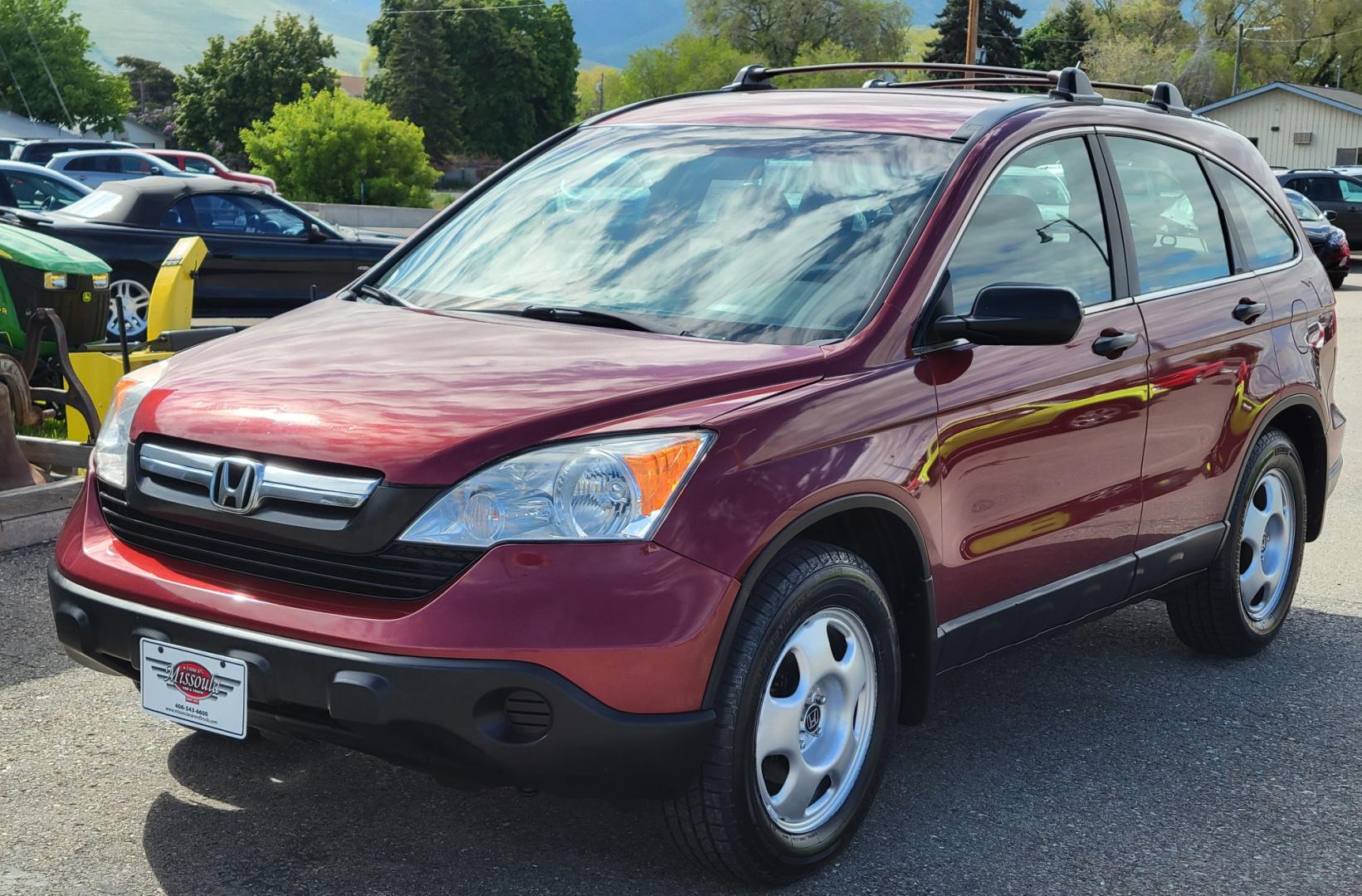 2009 Red /Gray Honda CR-V LX (5J6RE483X9L) with an 2.4L L4 engine, 5 Speed Automatic transmission, located at 450 N Russell, Missoula, MT, 59801, (406) 543-6600, 46.874496, -114.017433 - Great Running AWD SUV. 2.4L I4 Engine. 5 Speed Automatic Transmission. Air. Cruise. Tilt. Power Windows and Locks. New Tires. Roof Rack. Does have a Rebuilt Title so financing is not available. - Photo#1